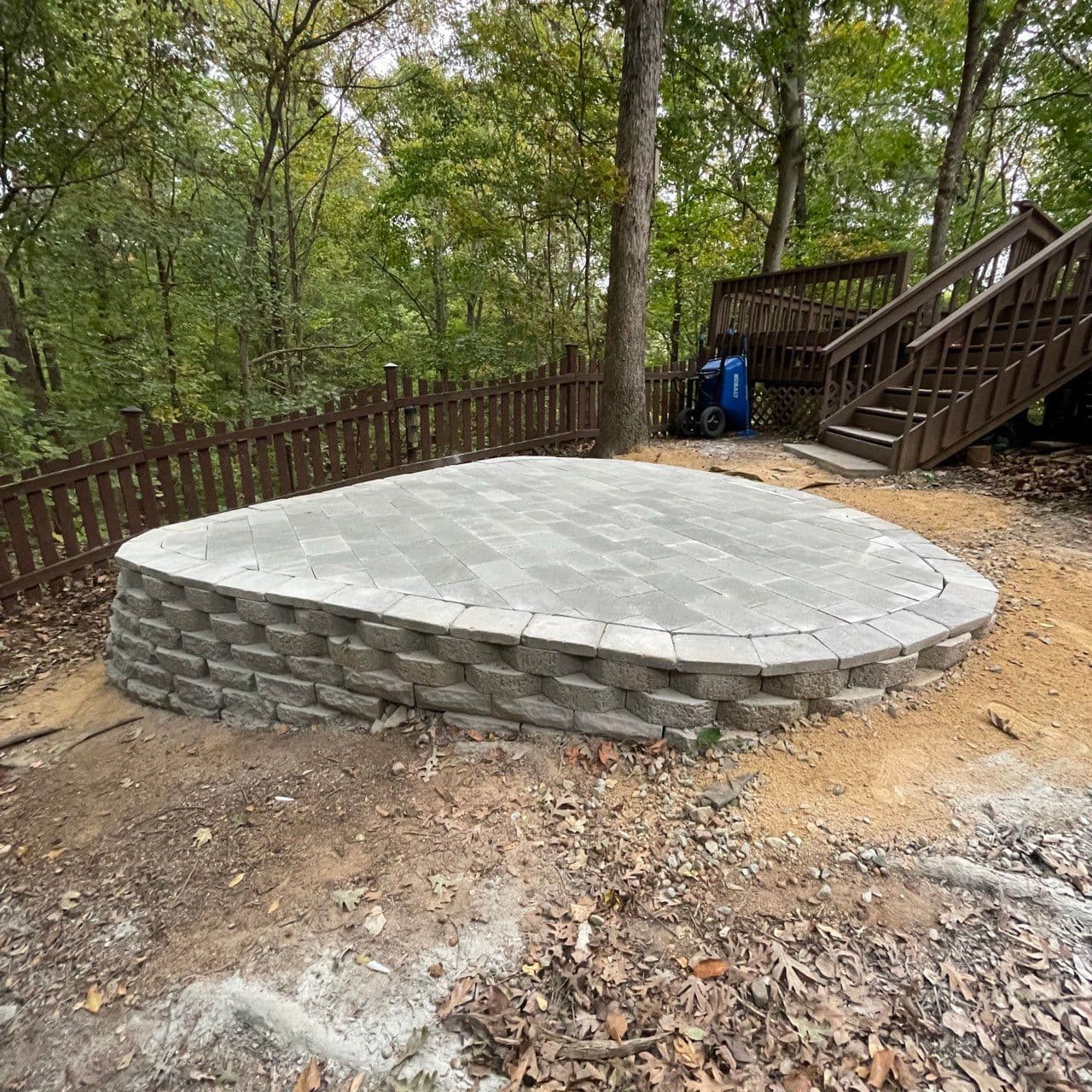 Project Heart-Shaped Paver Patio Installation in a Wooded Retreat image